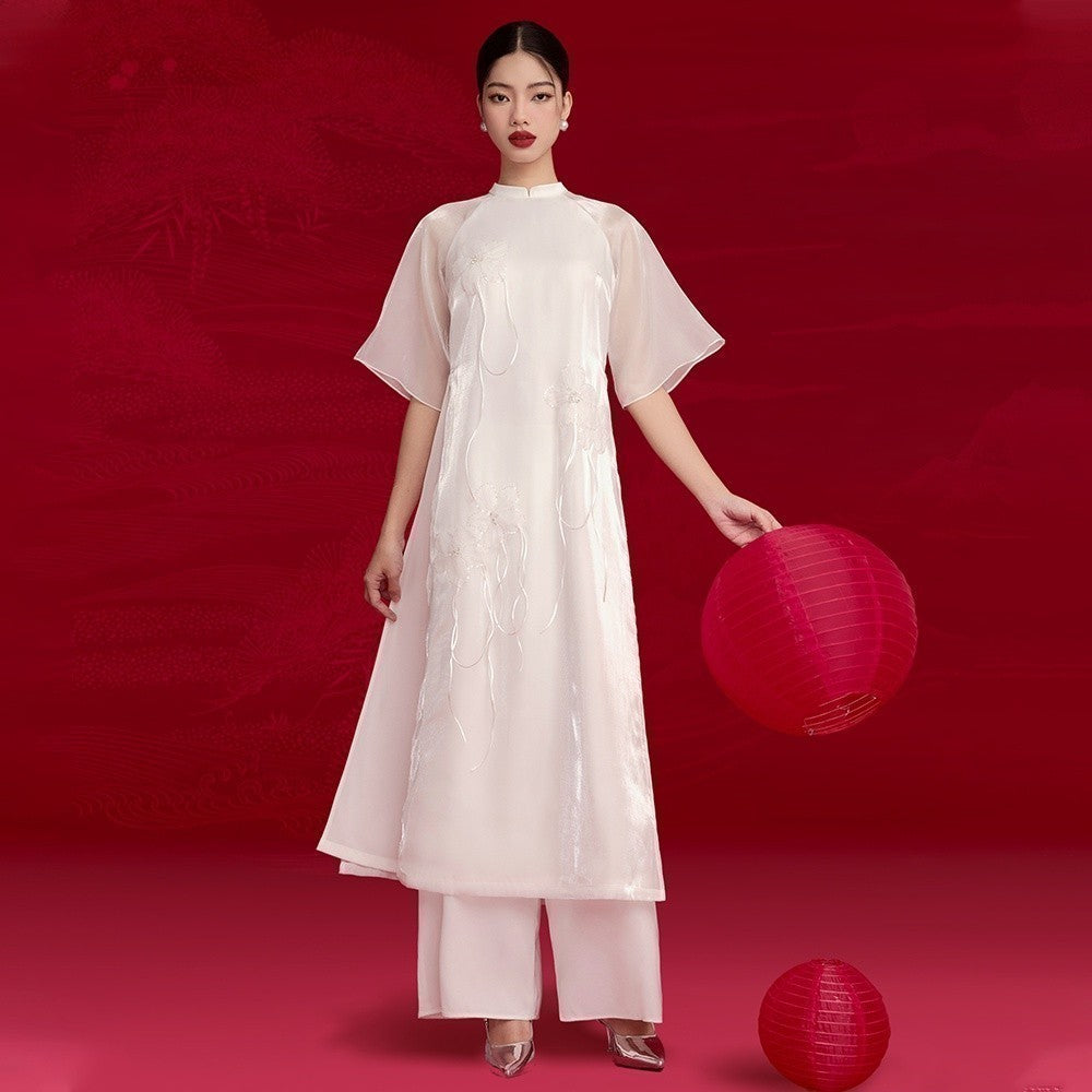 [BUY SHIRT AND GET PANTS] RECHIC Italian Ao Dai with low neck and half sleeves, elegant and gentle floral embroidery