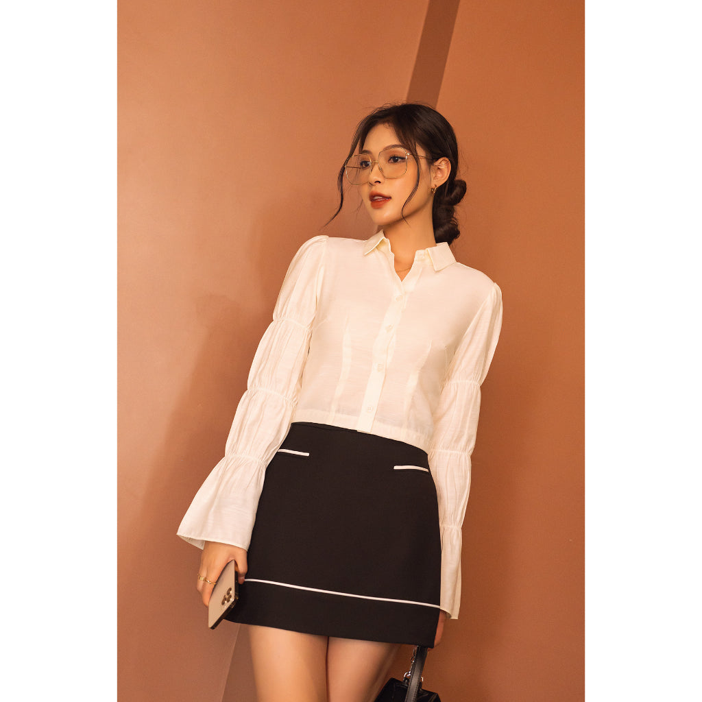 A pleated skirt with color combination VIENNE TRAN V62R23Q002