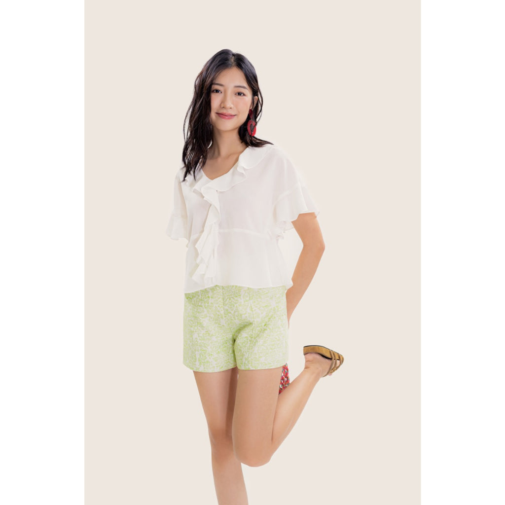 LIBÉ - Straight-leg shorts with light green embossed patterns