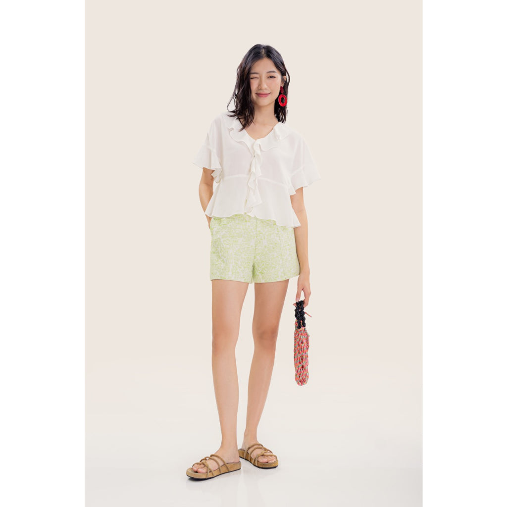 LIBÉ - Straight-leg shorts with light green embossed patterns