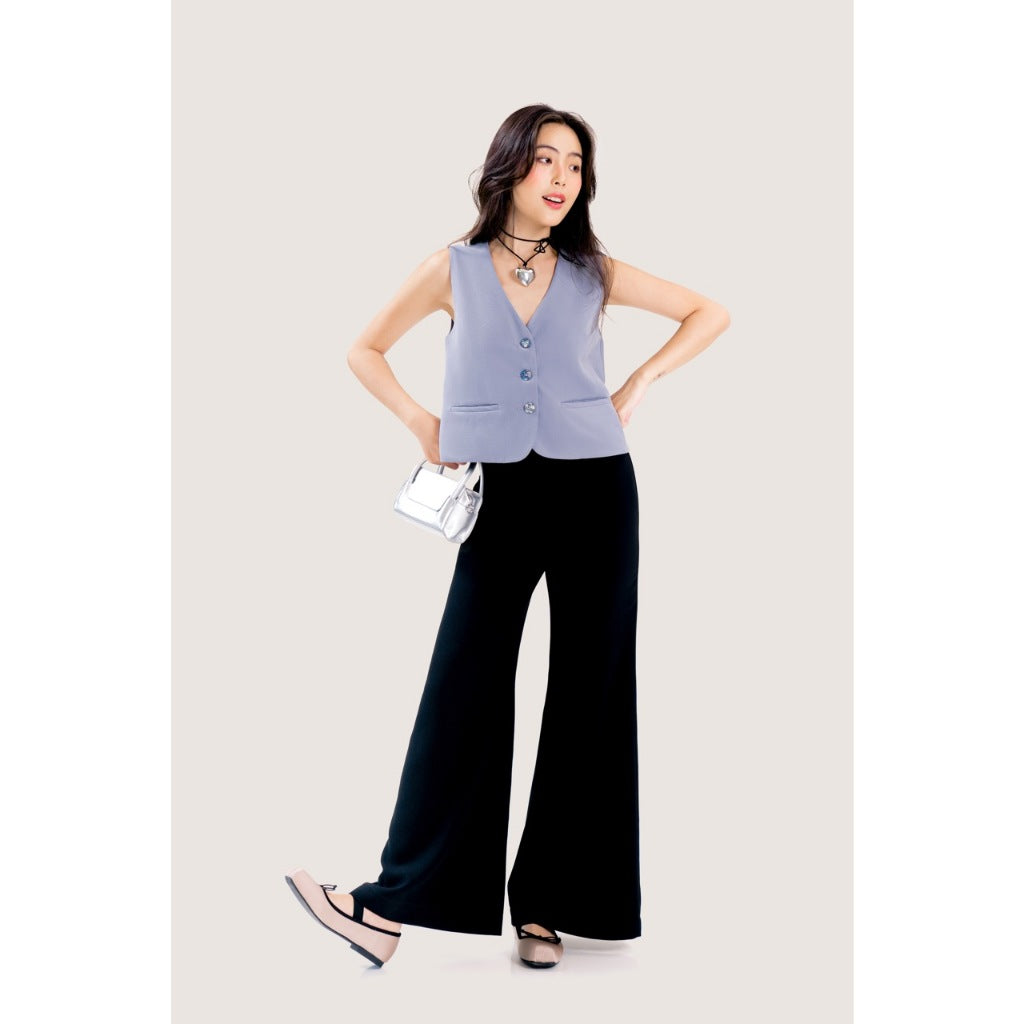 LIBÉ WORKSHOP High-waisted flared pants with straps and front metal hooks in black