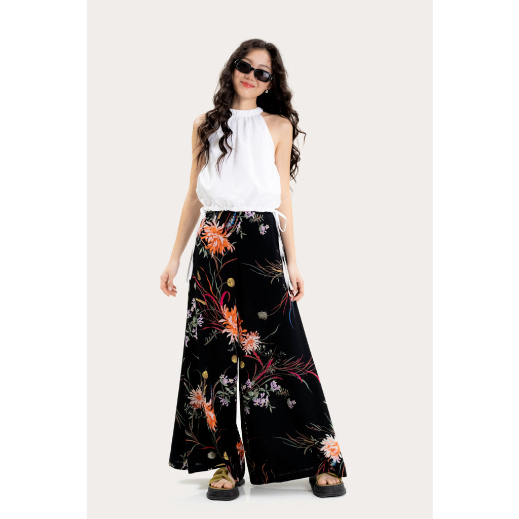 LIBÉ WORKSHOP - Wide leg pants with floral print and black background