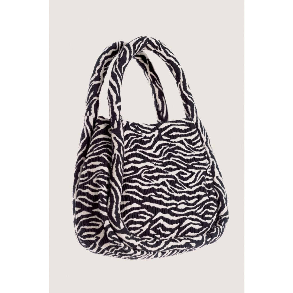 LIBÉ WORKSHOP - Trapezoidal hand bag with zebra pattern