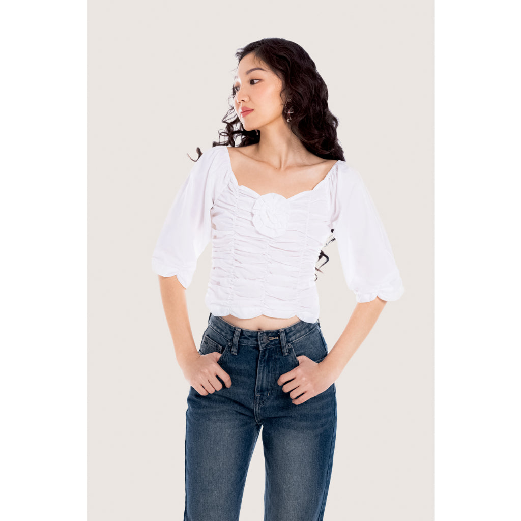 LIBÉ WORKSHOP - Off-the-shoulder shirt with puffy sleeves and white floral appliqués