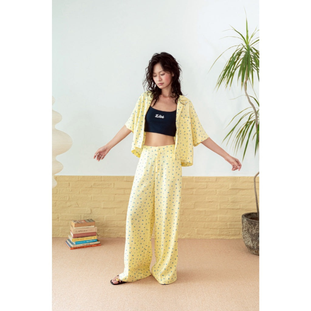 LIBÉ WORKSHOP - Long straight pants with yellow floral patterns