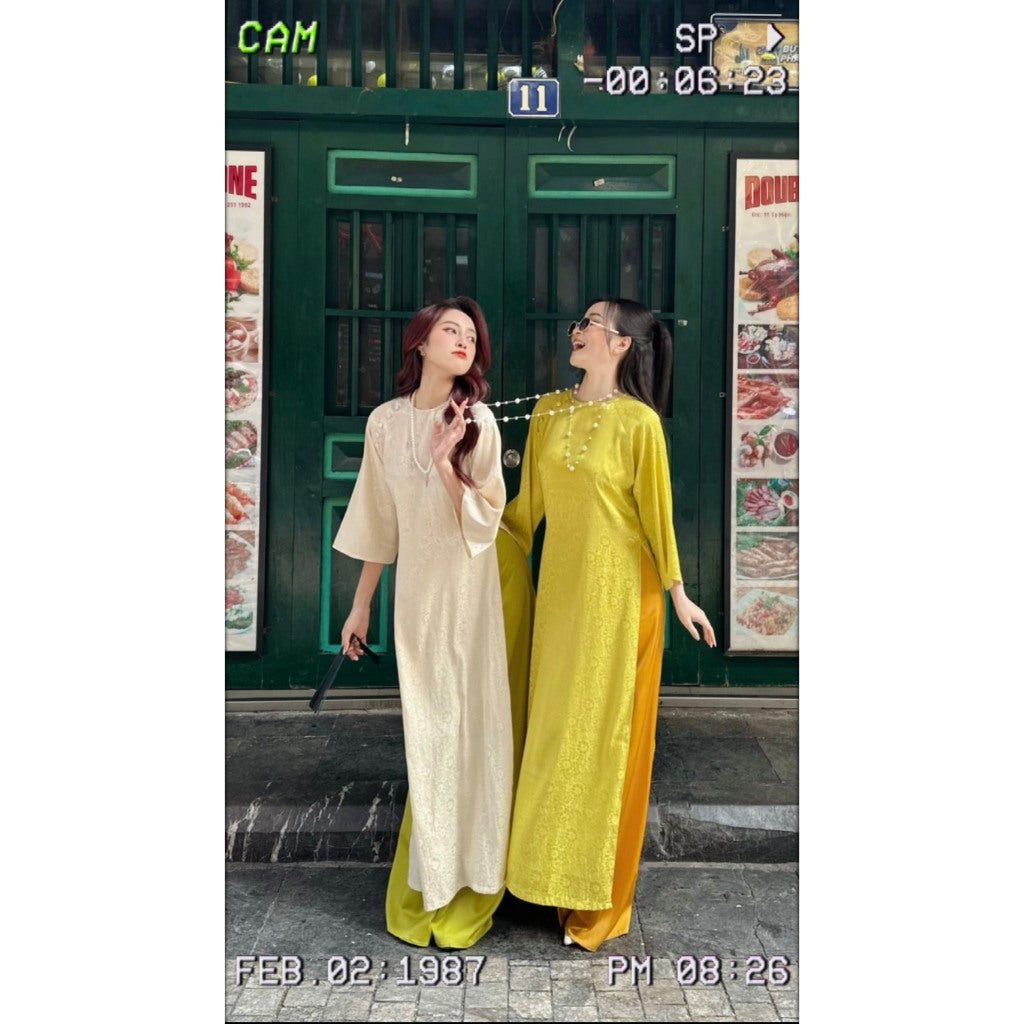 Loose-fitting brocade Ao Dai in various colors, modern Ao Dai with subtle floral patterns, easy to wear for any occasion. 