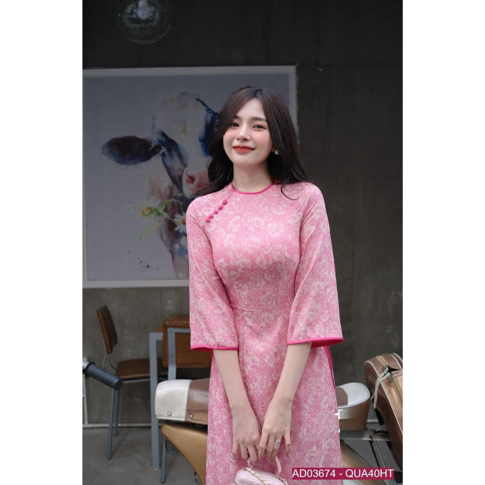 Traditional Ao Dai dress with floral brocade pattern, fitted waist, cuffed hem, and contrasting colors - Moc An Ao Dai 