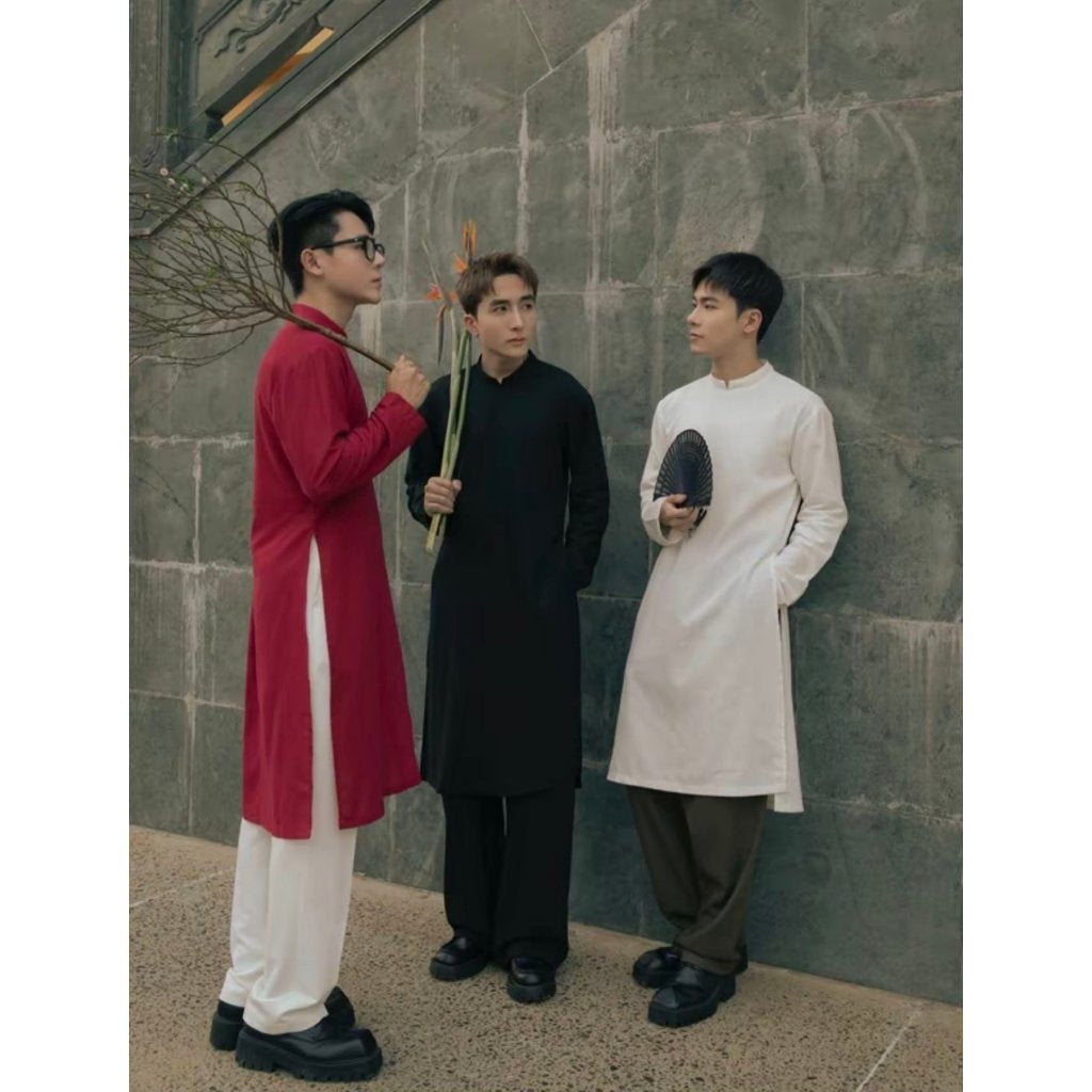 Modernized Ao Dai for Men, made of Tay Thi fabric, with square shoulders, padded shoulder straps, and a back zipper closure. Perfectly fitted and flattering. 