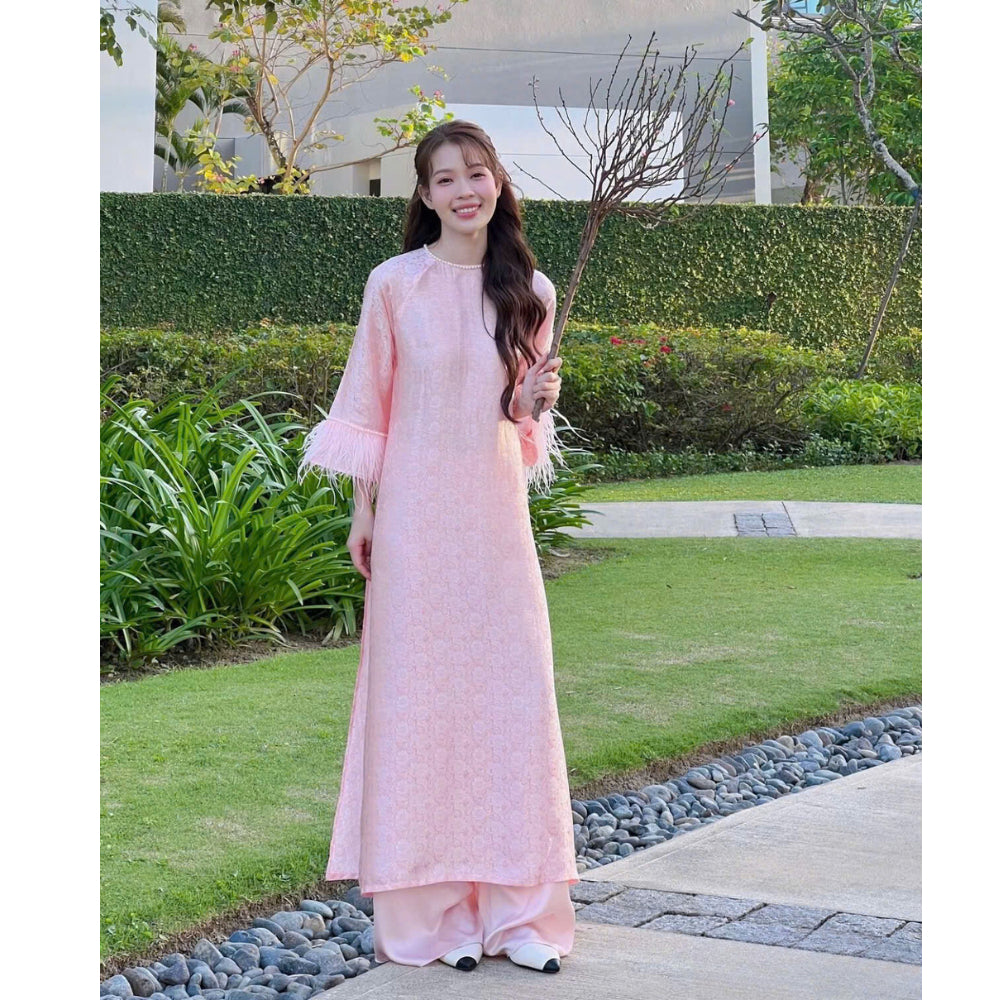 Loose-fitting brocade Ao Dai with flared sleeves and feather embellishments - Moc An Ao Dai 