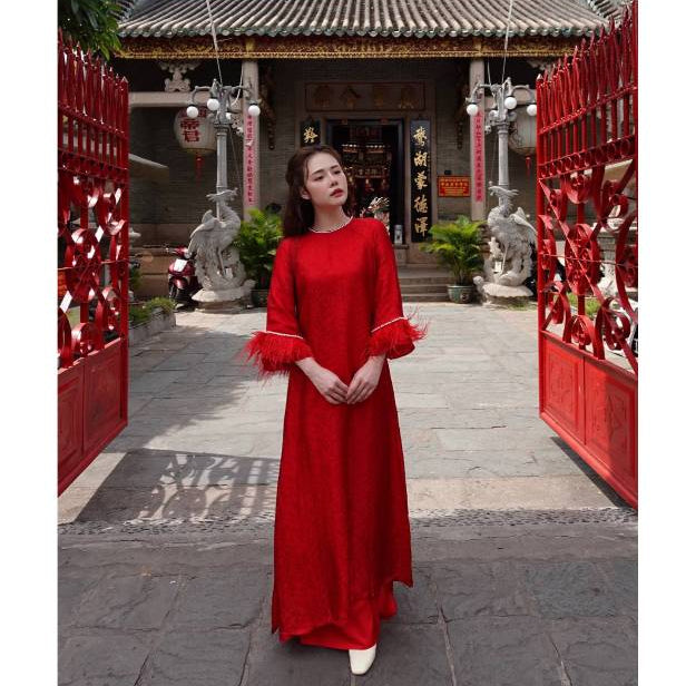 Loose-fitting brocade Ao Dai with flared sleeves and feather embellishments - Moc An Ao Dai 