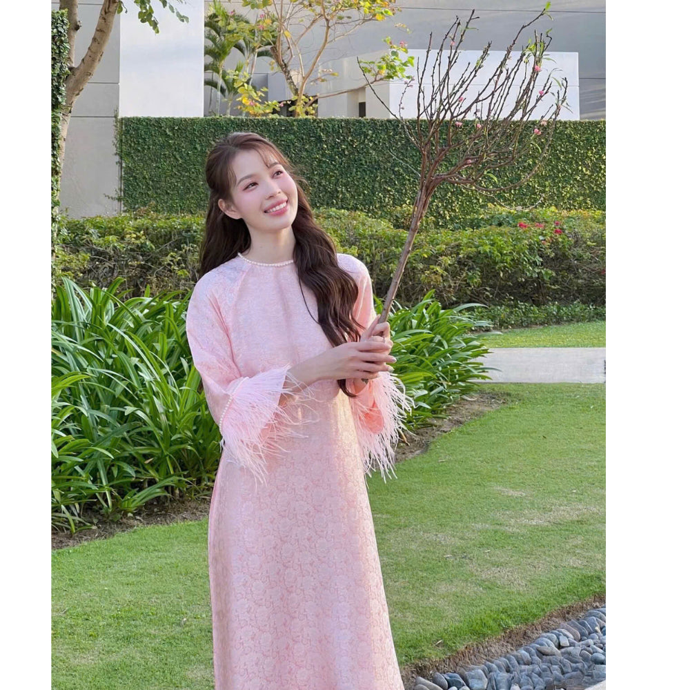 Loose-fitting brocade Ao Dai with flared sleeves and feather embellishments - Moc An Ao Dai 