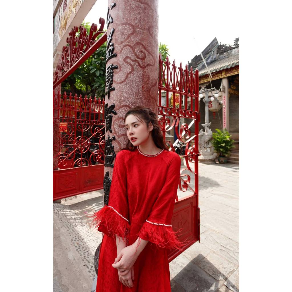 Loose-fitting brocade Ao Dai with flared sleeves and feather embellishments - Moc An Ao Dai 