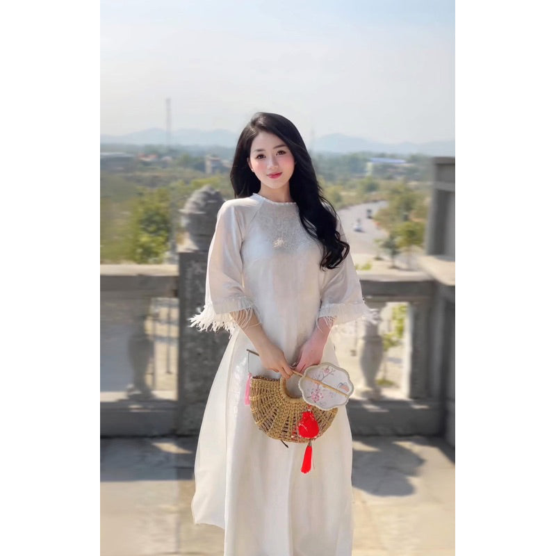 Loose-fitting brocade Ao Dai with flared sleeves and feather embellishments - Moc An Ao Dai 