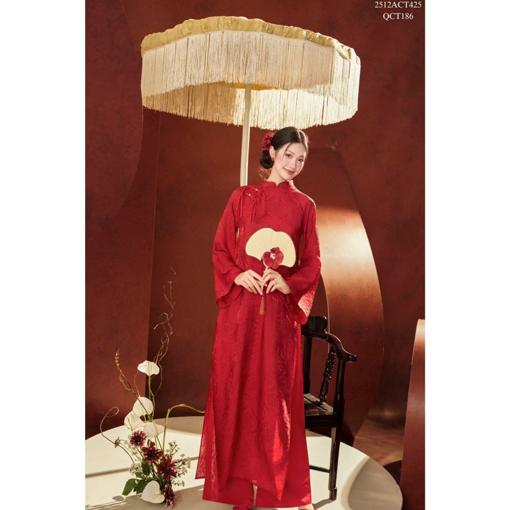 Traditional Tet Ao Dai dress with mandarin collar, loose fit, and bow detail (Pants not included) 2512ACT425